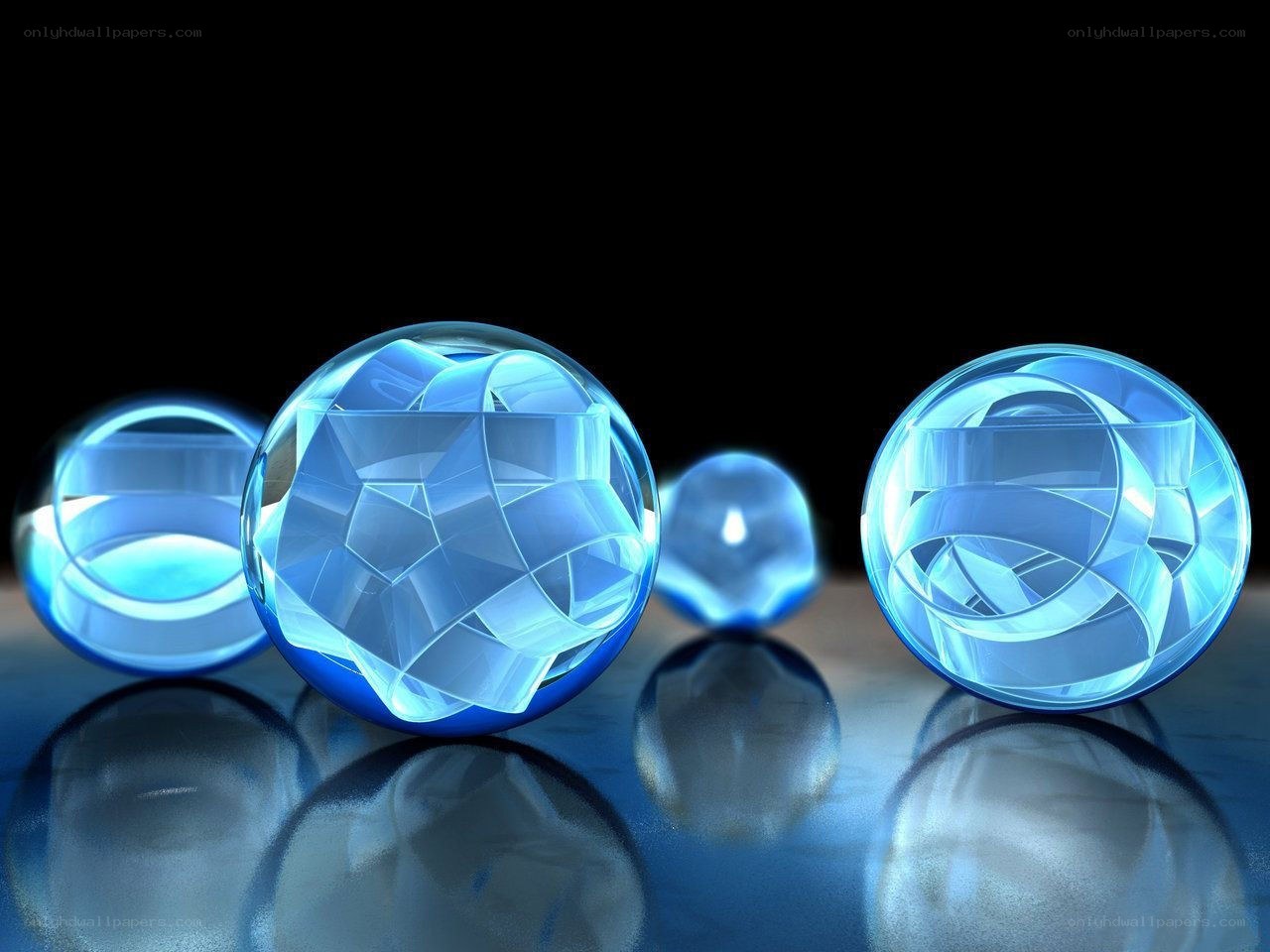 Blue glass spheres on reflective surface