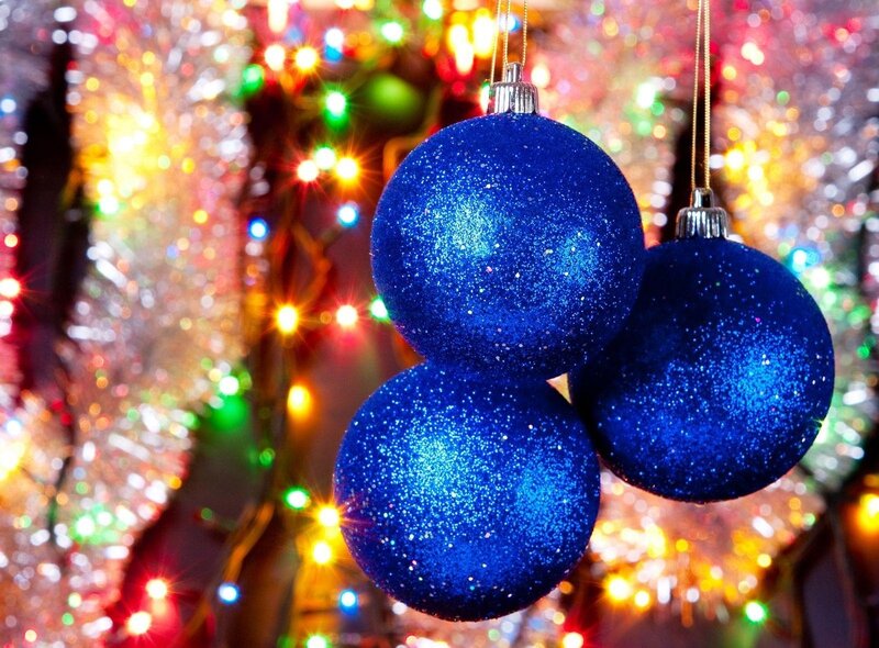 blue glitter ornaments on tree