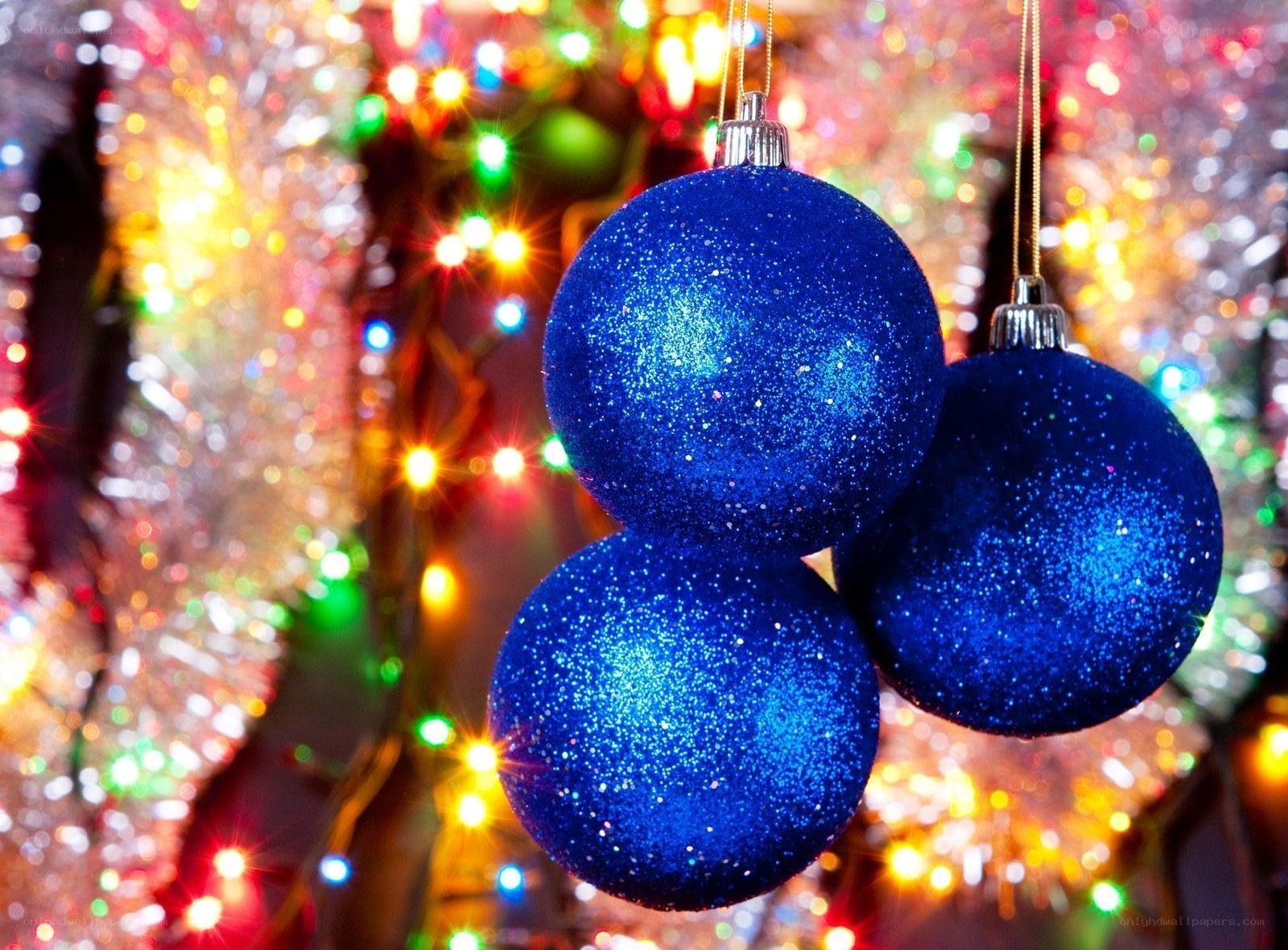 blue glitter ornaments on tree