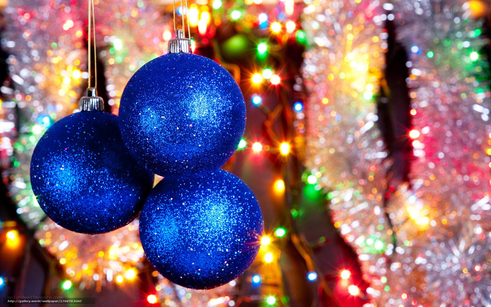 blue glitter ornaments on tree
