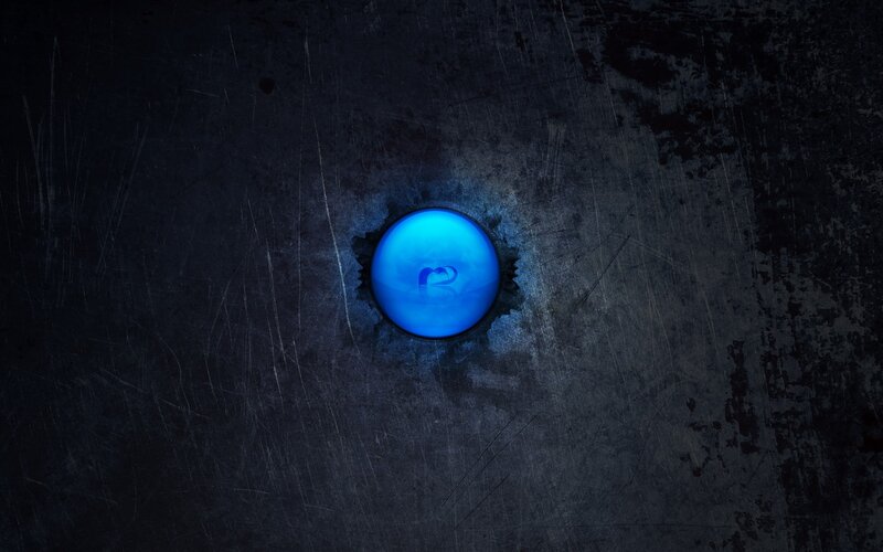 blue glowing button on metal