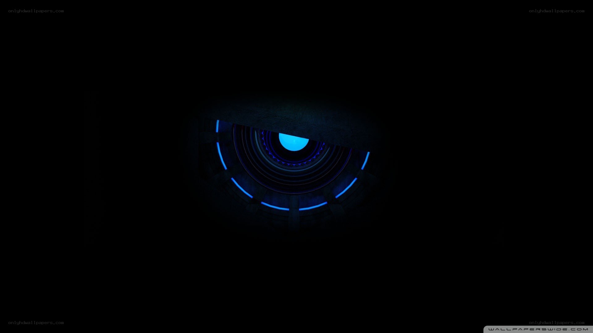 blue glowing eye in darkness