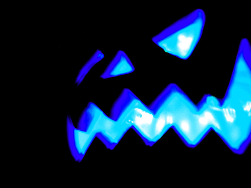 blue glowing jack-o-lantern face