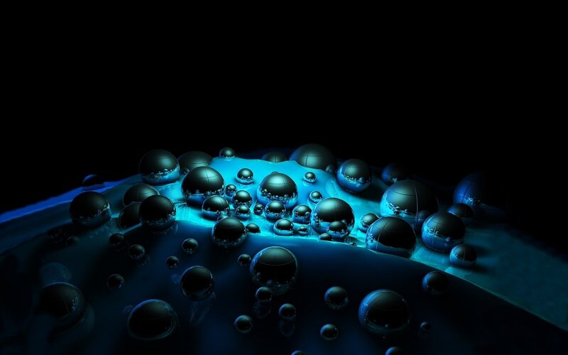 blue glowing spheres on dark surface
