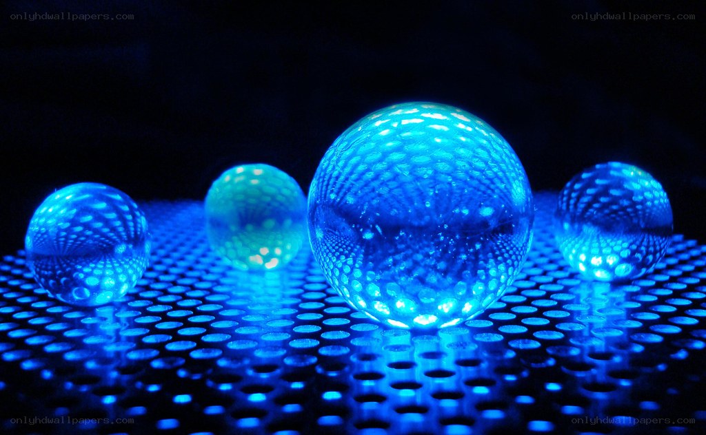 blue glowing spheres on perforated surface