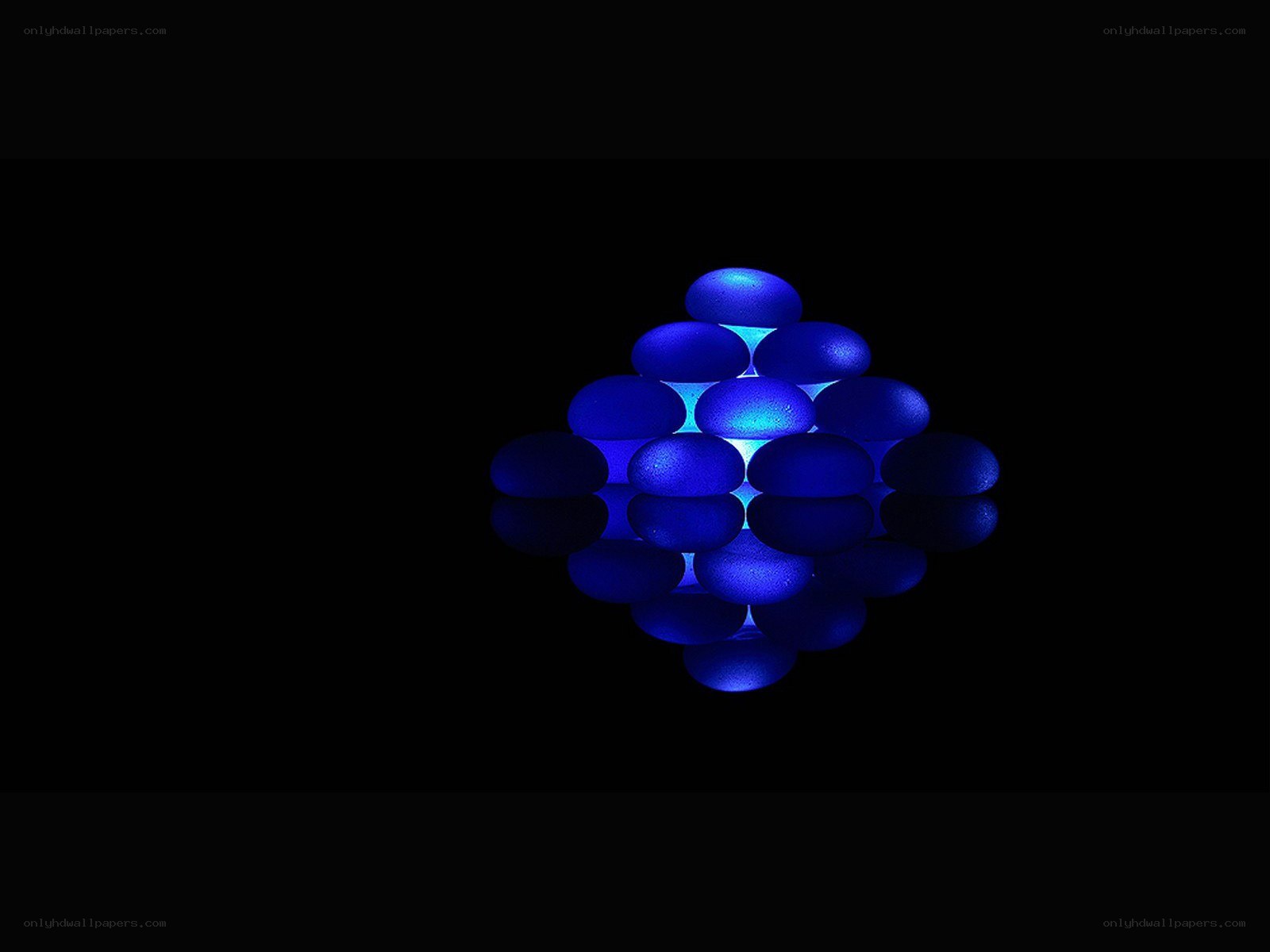 blue glowing stones pyramid