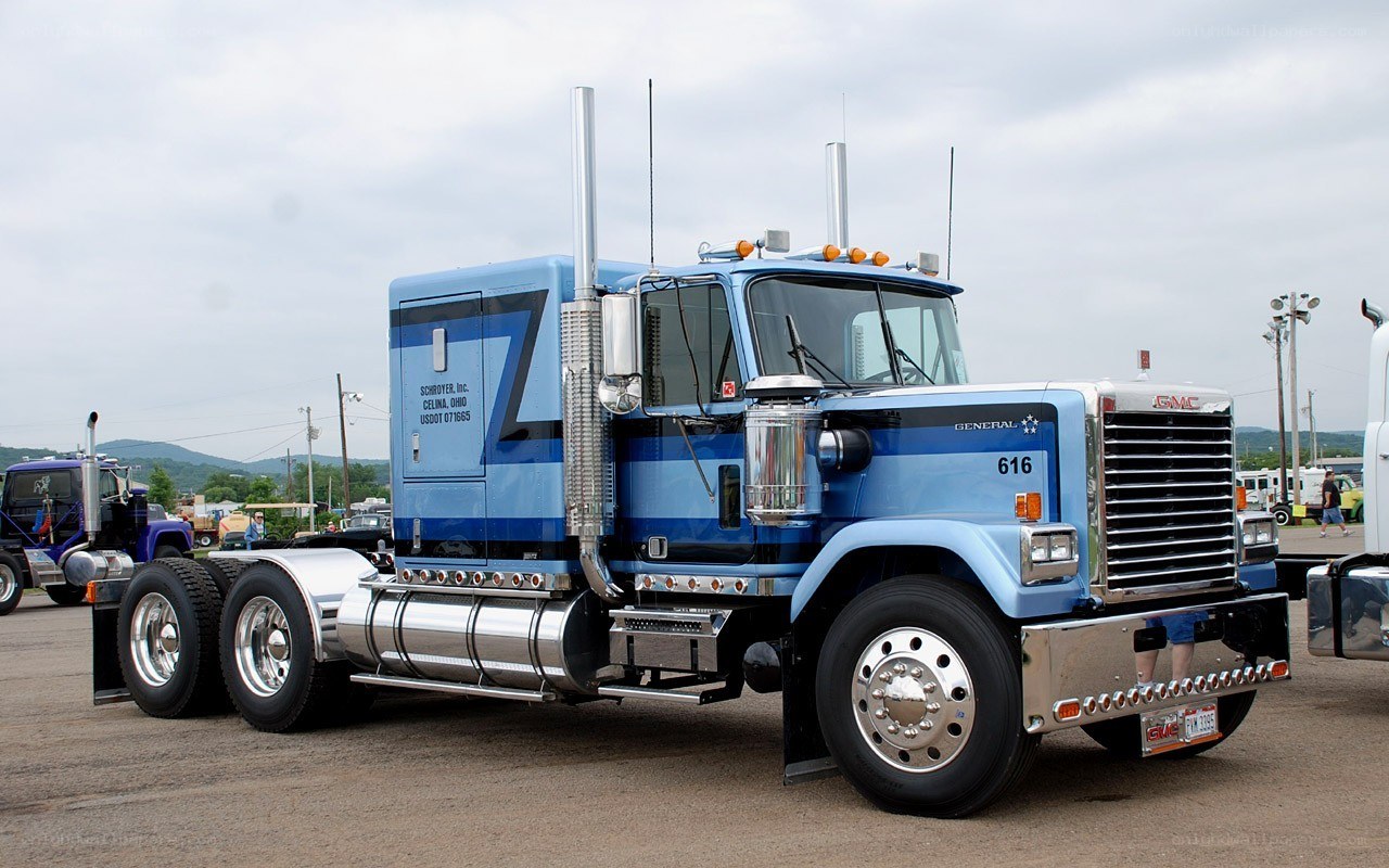 blue gmc semi-truck