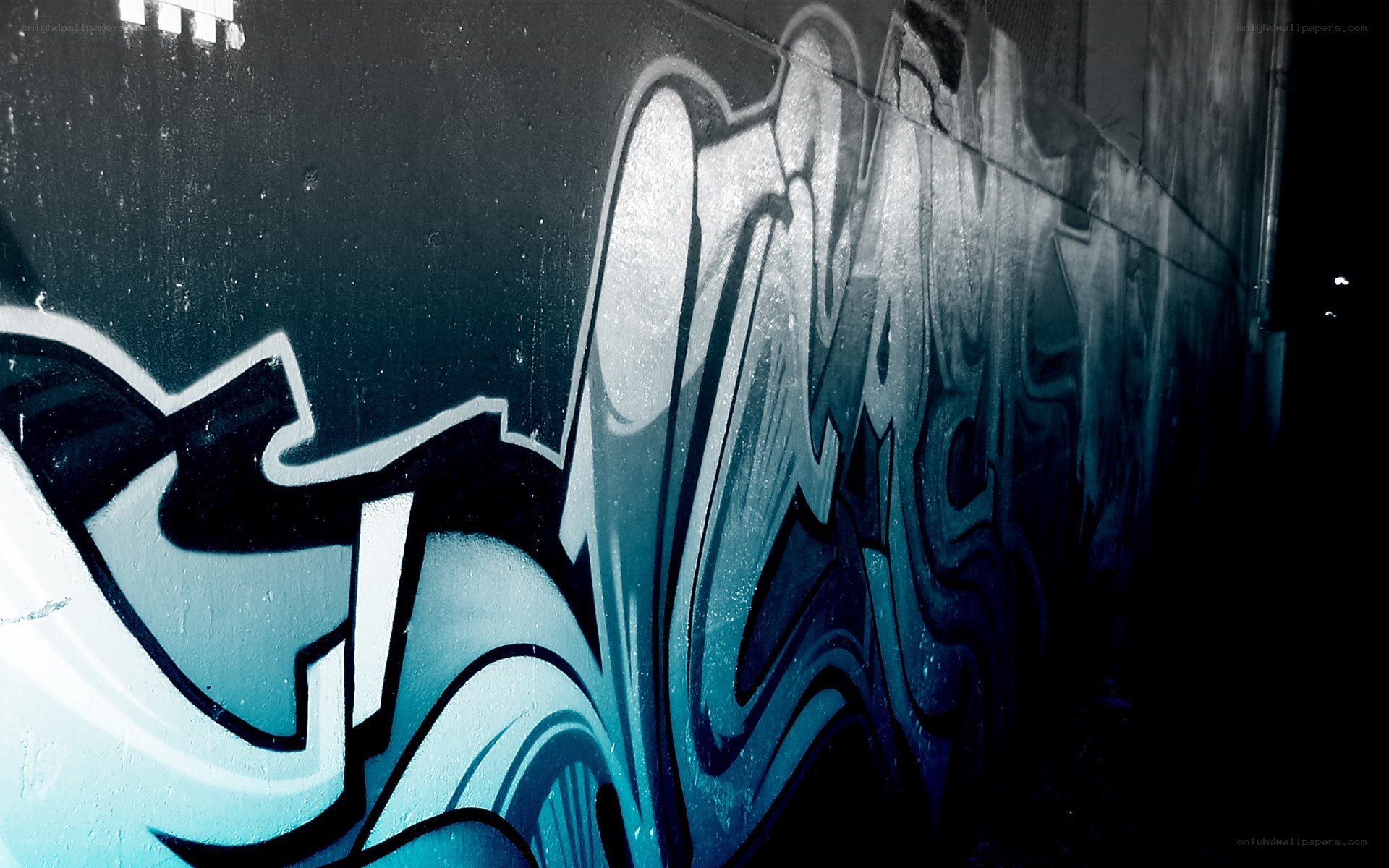 Blue graffiti on a wall