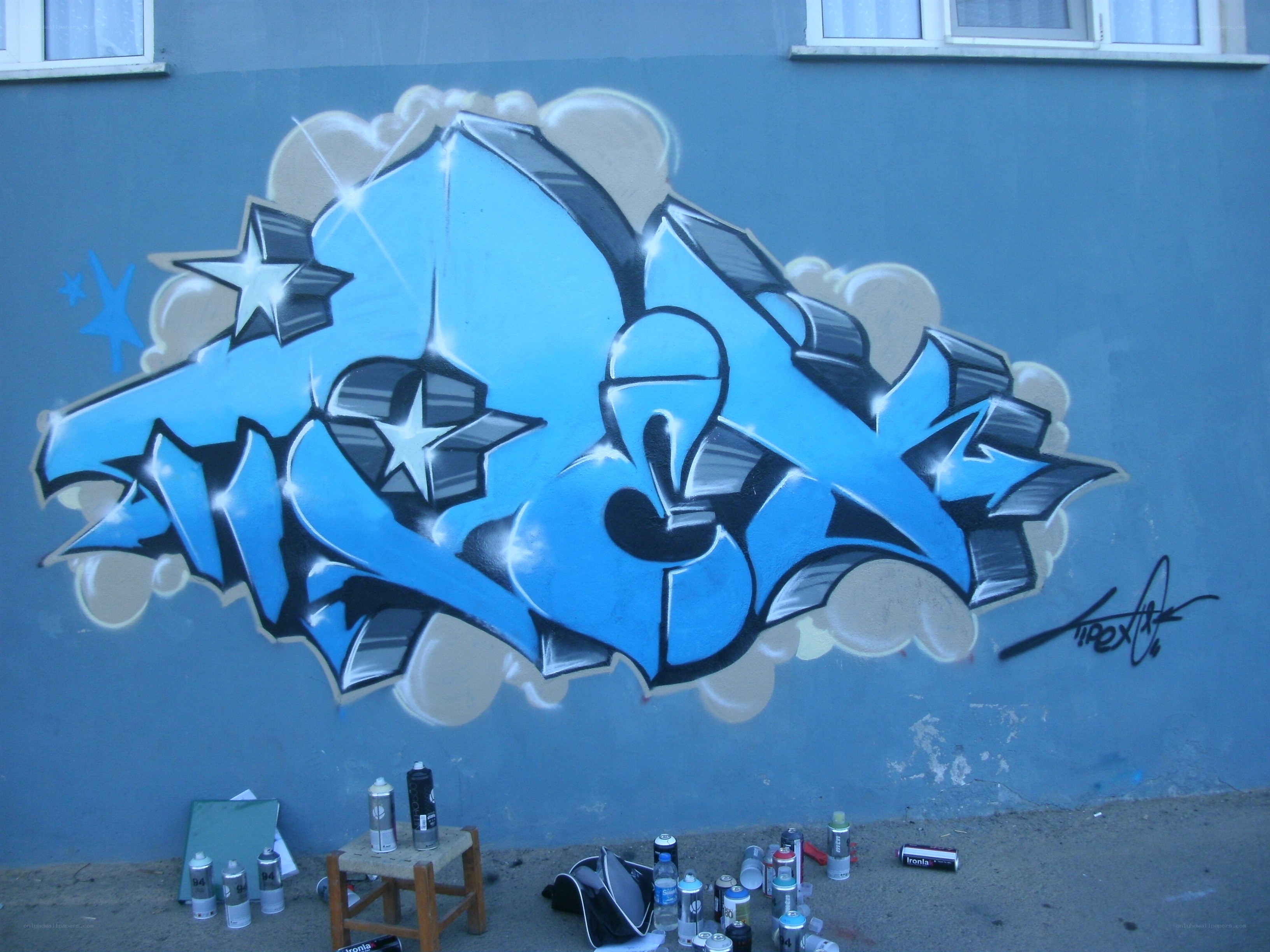 Blue graffiti on a wall