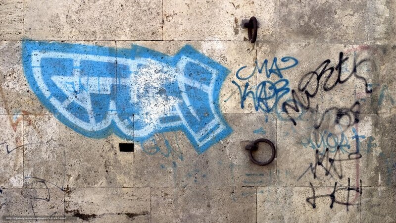 Blue Graffiti on Concrete Wall