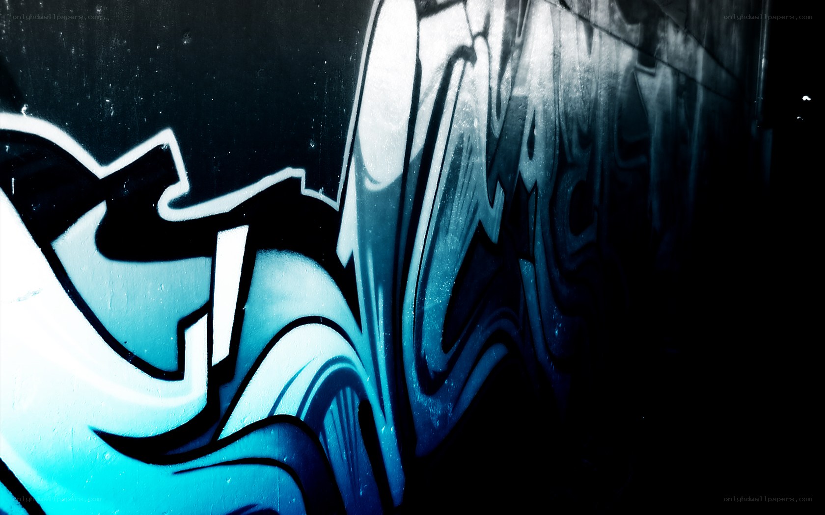 blue graffiti on dark wall