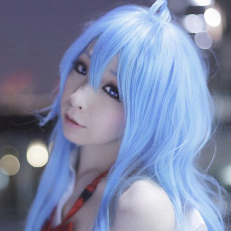 blue-haired cosplayer at night