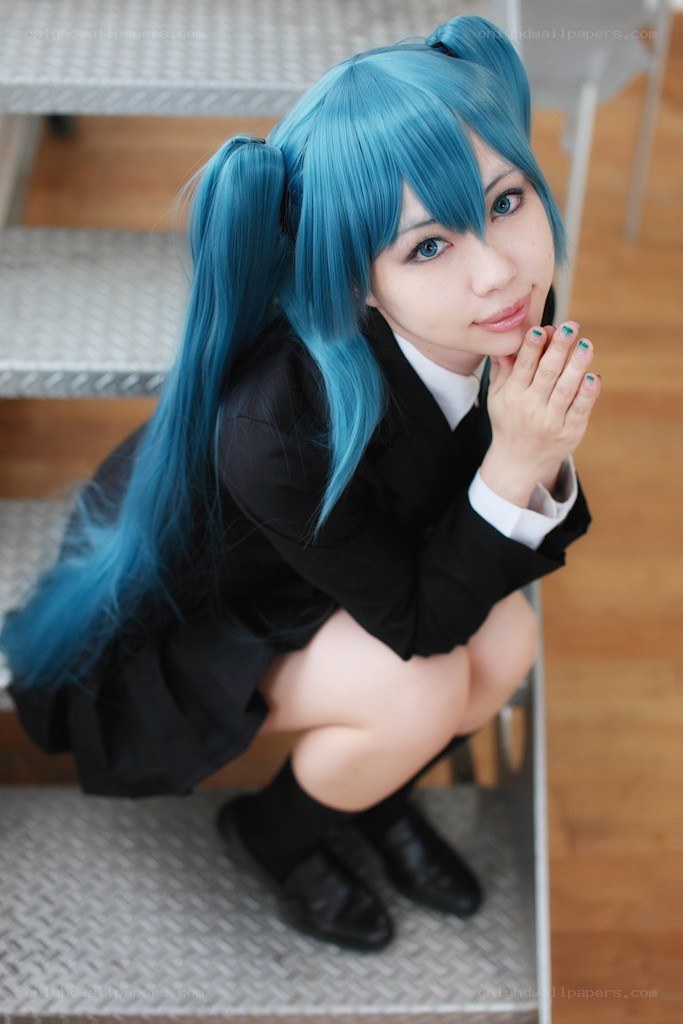 blue-haired cosplayer in school uniform
