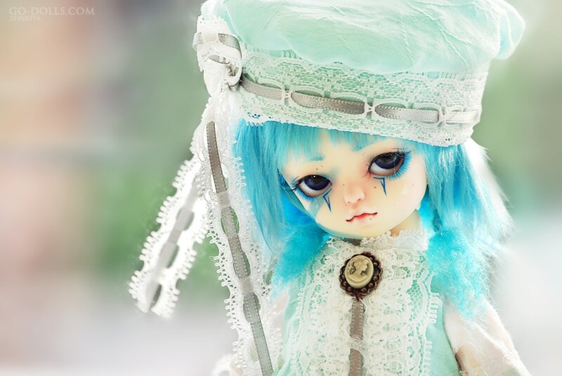 Blue-haired Doll in Hat