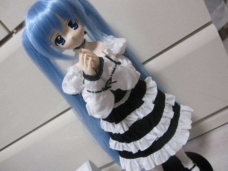 blue-haired doll in maid outfit