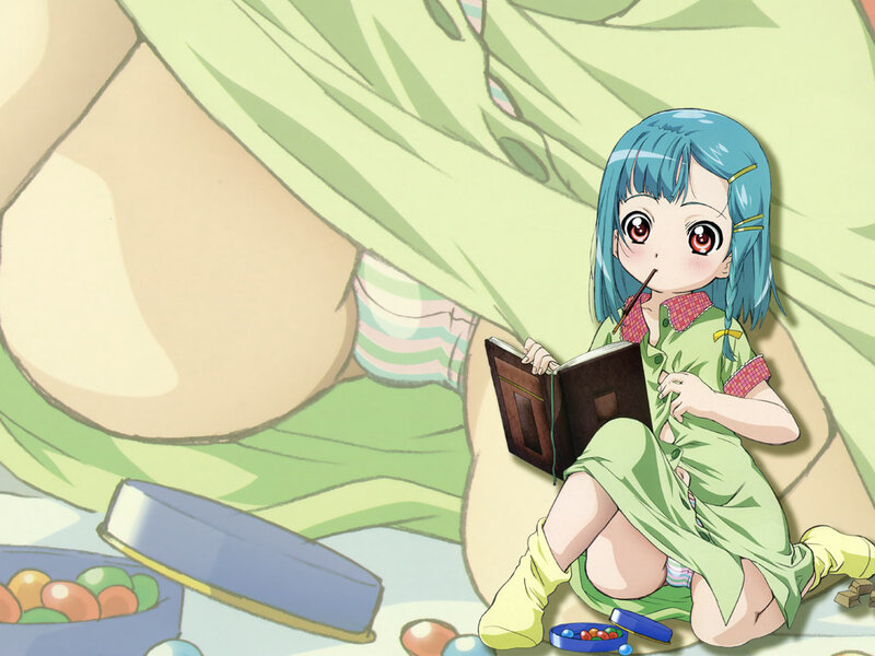 blue-haired girl reading book