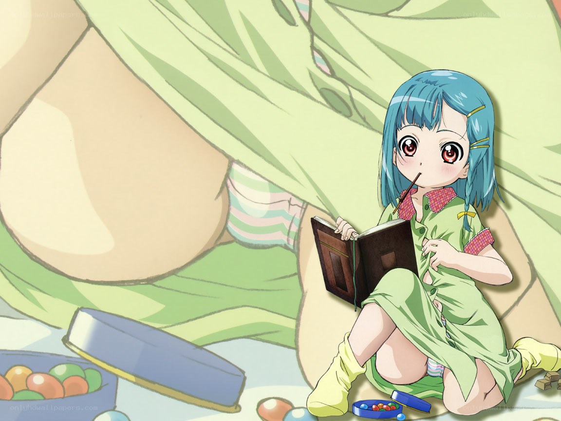 blue-haired girl reading book