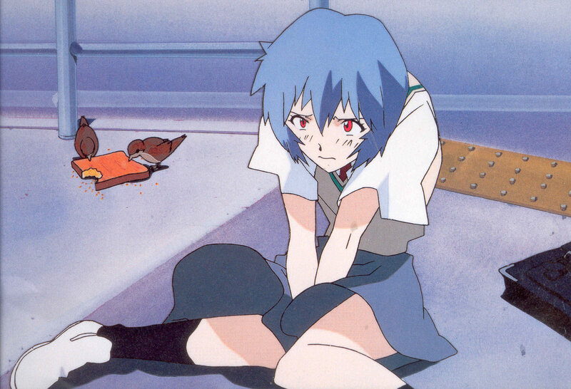 blue-haired girl sitting on ground
