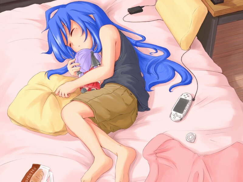 Blue-haired girl sleeping on bed