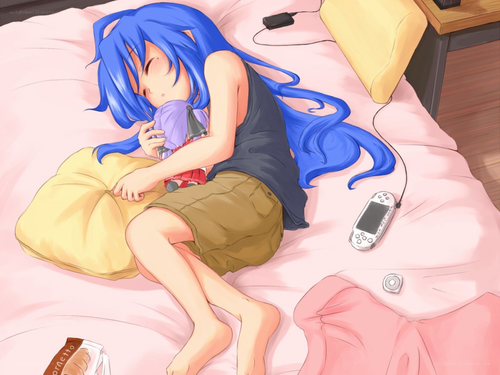 Blue-haired girl sleeping on bed
