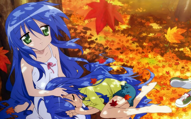 Blue-haired girl with autumn leaves