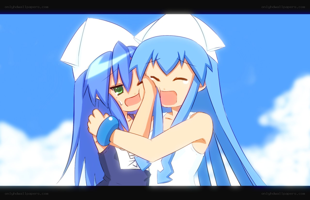 Blue-haired girls hugging