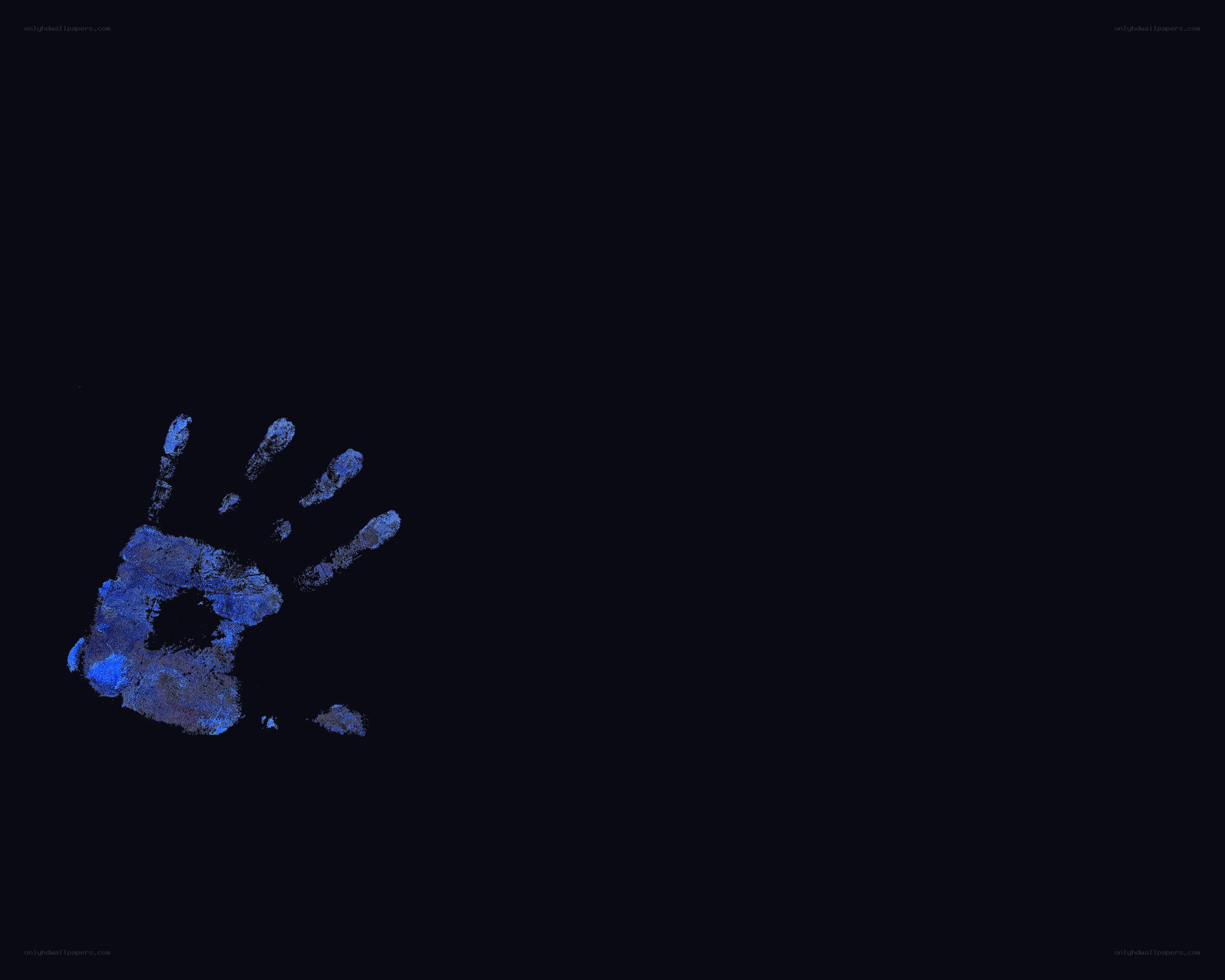 blue handprint on black