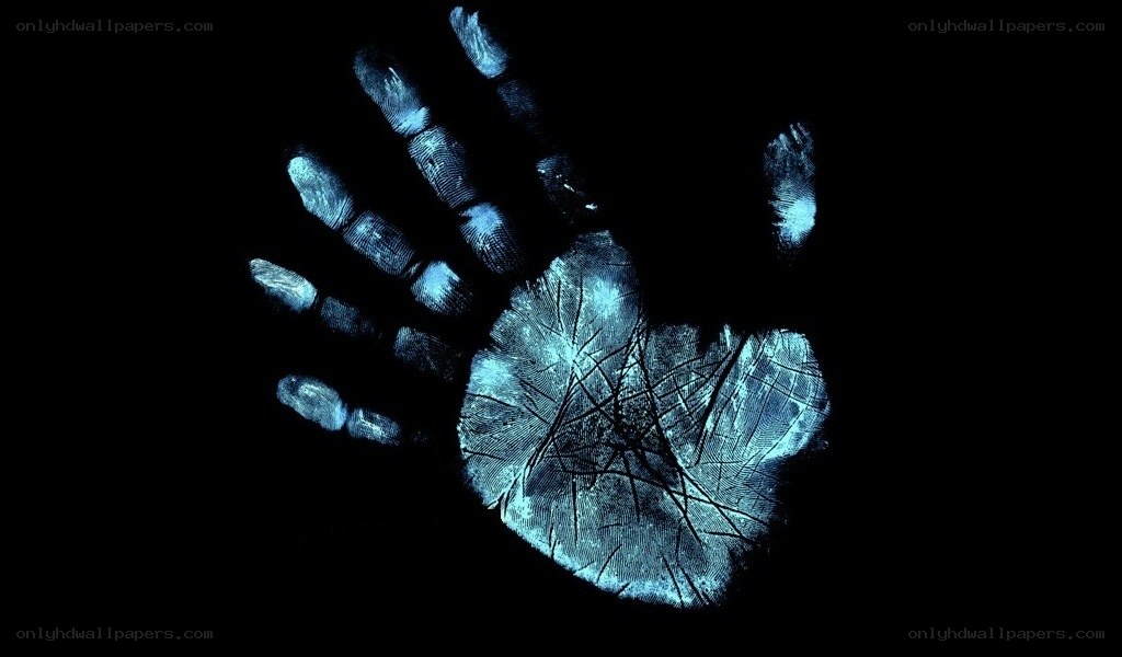 blue handprint on black