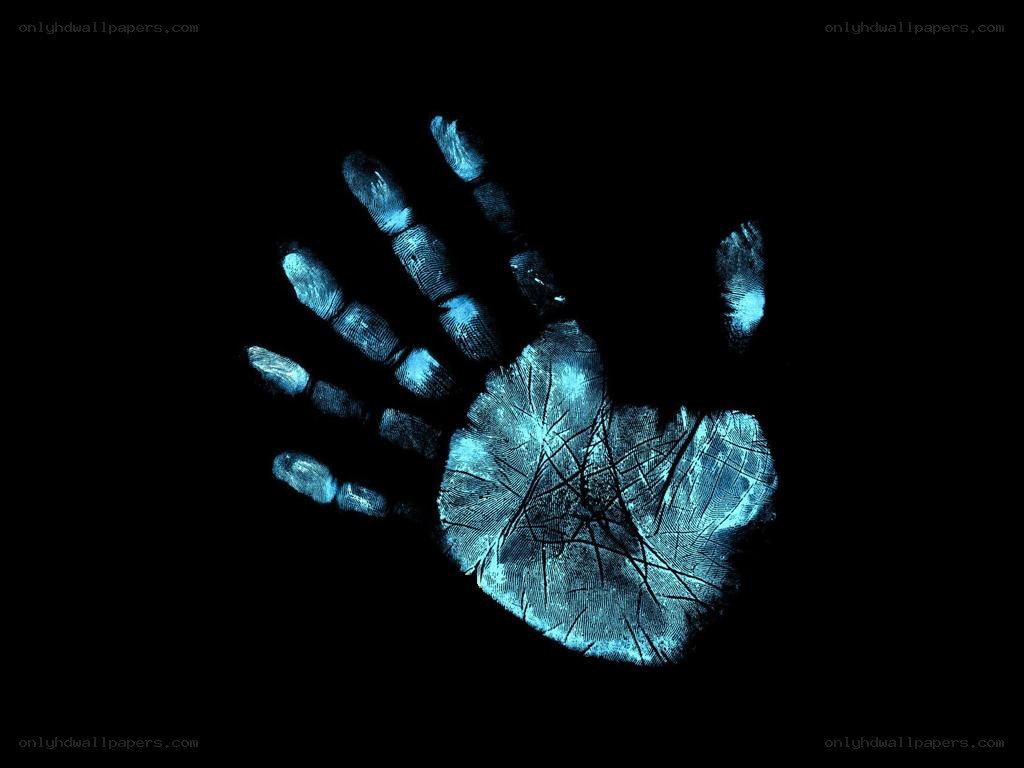 blue handprint on black