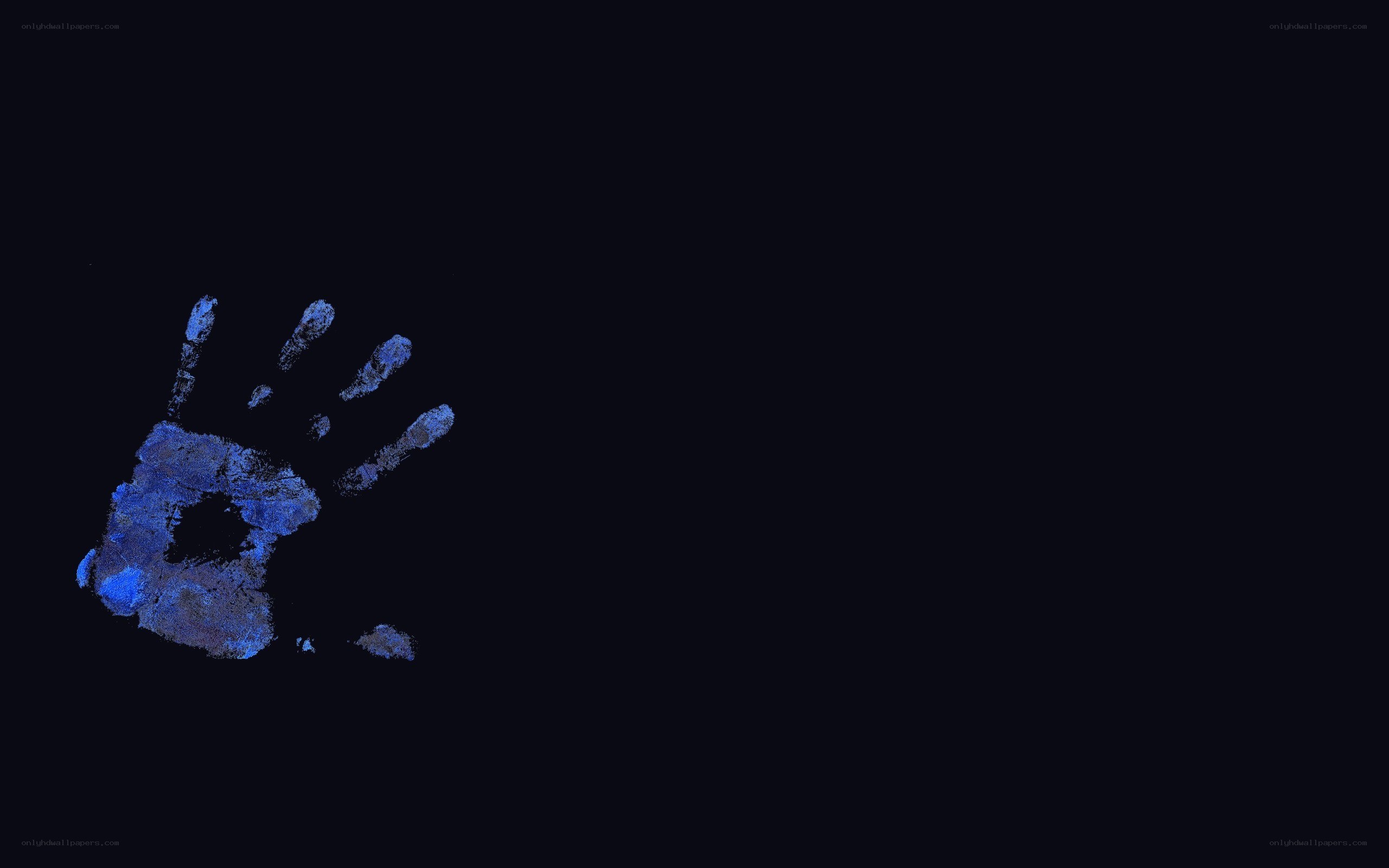 blue handprint on black