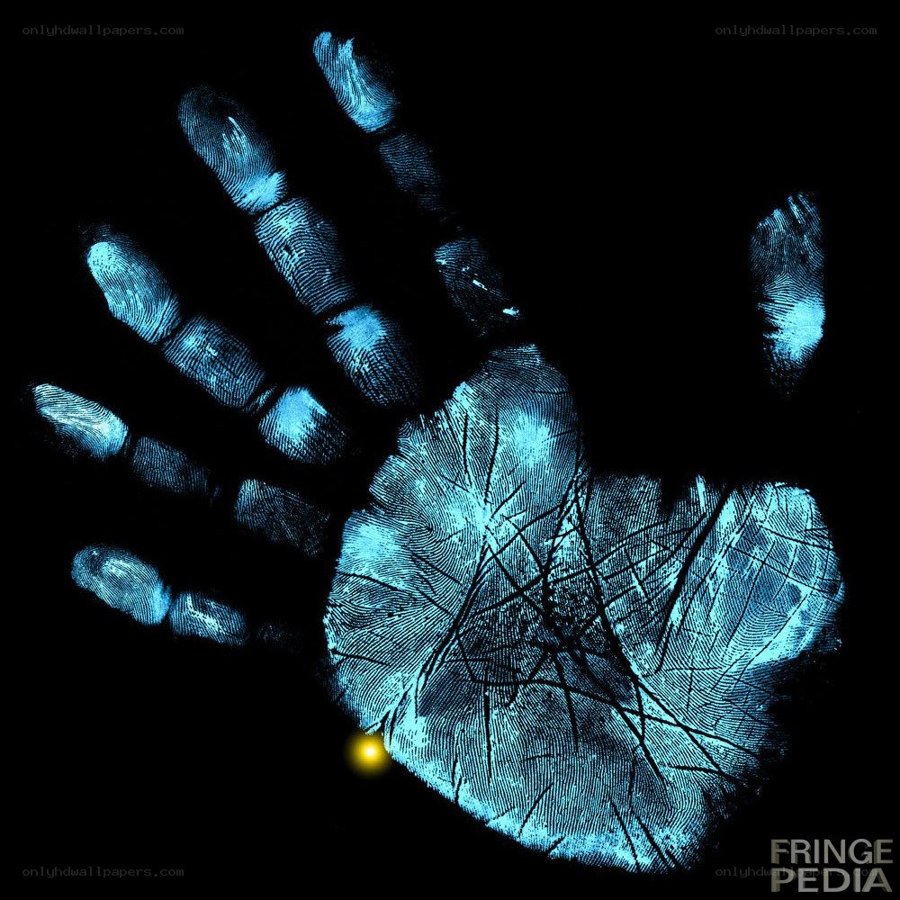 blue handprint on black background