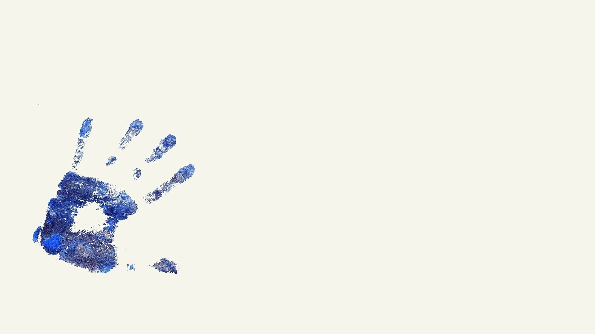 blue handprint on white background