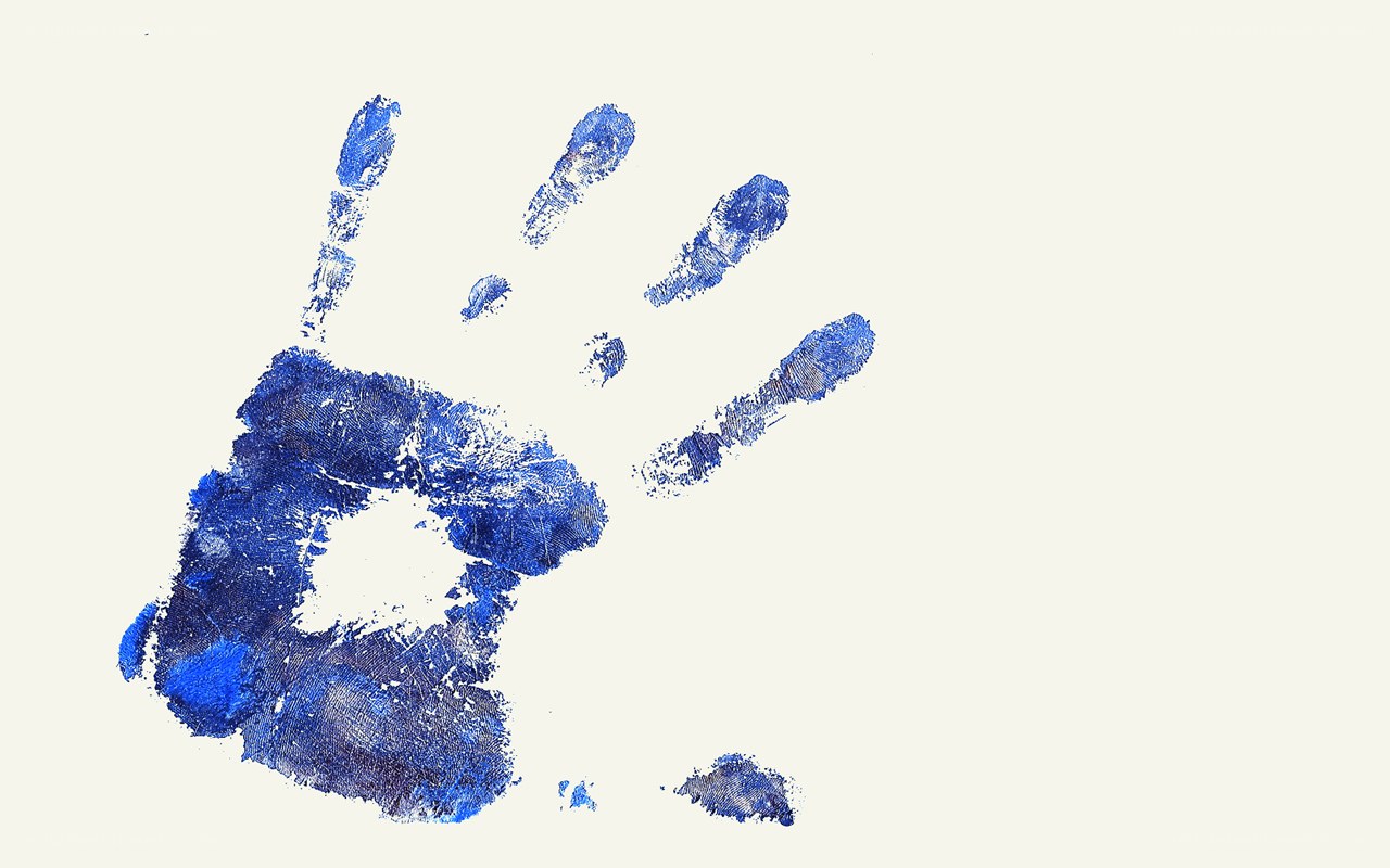 blue handprint on white
