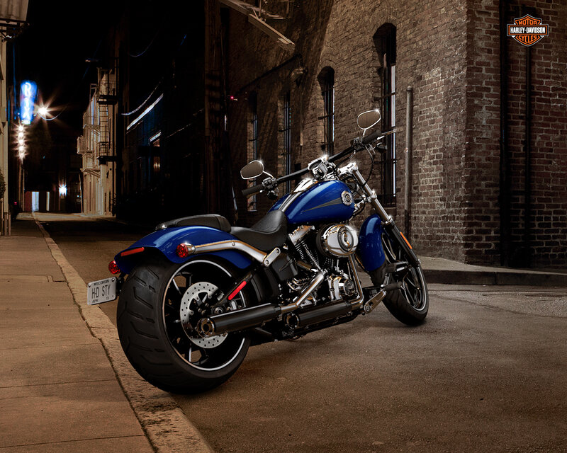 Blue Harley-davidson Motorcycle — Dramatic, Night, Photograph, Brick Building