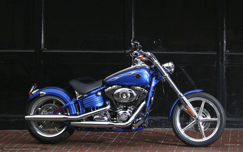 Blue Harley-davidson Motorcycle — Dramatic, Photograph, Brick Pavement, Black Wall