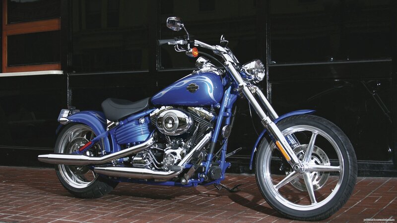 Blue Harley-davidson Motorcycle — Dramatic, Photograph, Building, Brick Pavement