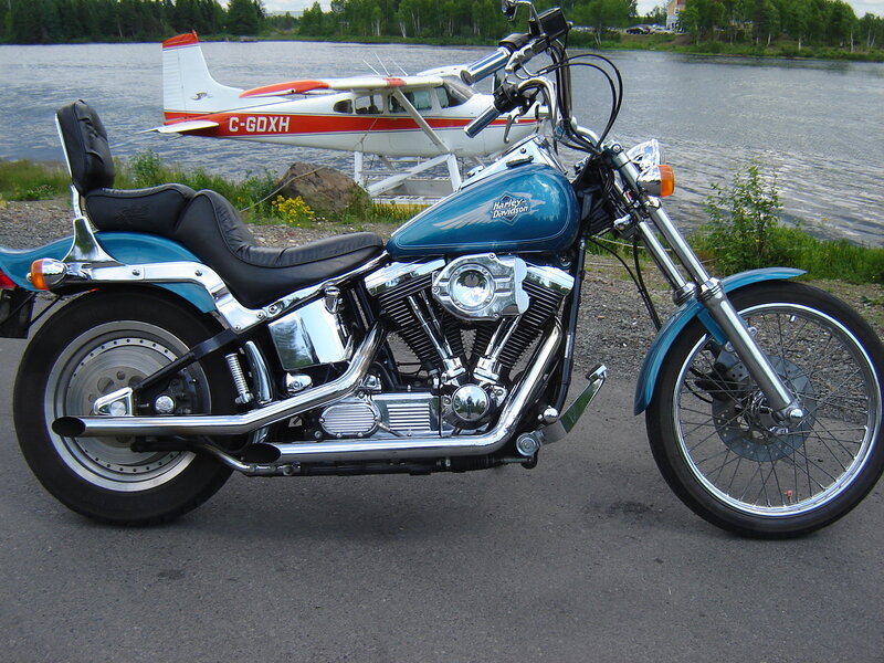 Blue Harley-Davidson Motorcycle — Serene, Afternoon, Photograph, Seaplane