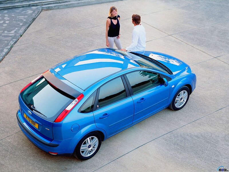 Blue Hatchback Car — Calm, Afternoon, Photograph, Man