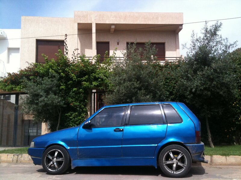 Blue Hatchback Car — Calm, Afternoon
