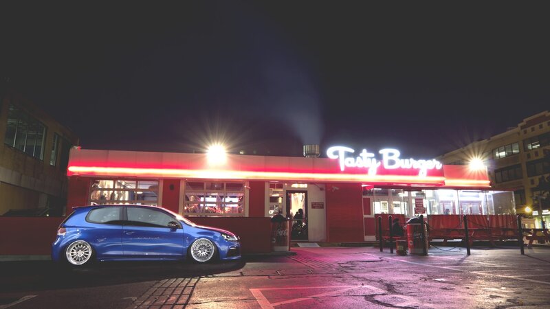 Blue Hatchback Car — Dramatic, Night, Photograph, Burger Restaurant