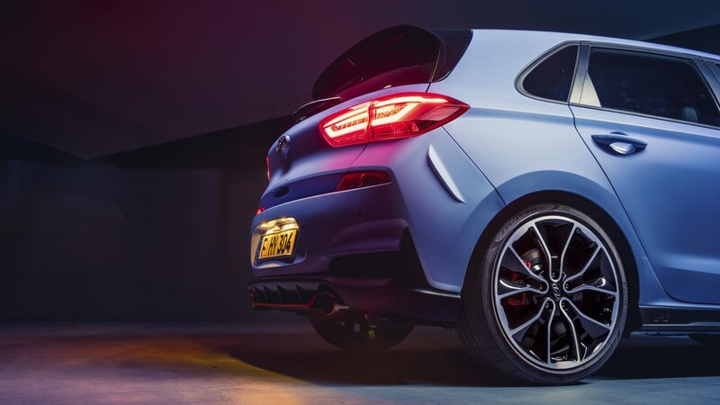 Blue Hatchback Car — Dramatic, Night