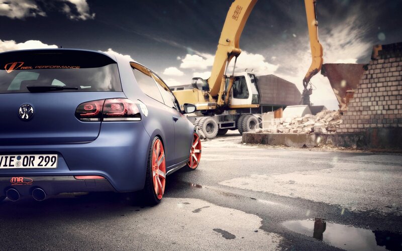 Blue Hatchback Car — Dramatic, Photograph, Excavator
