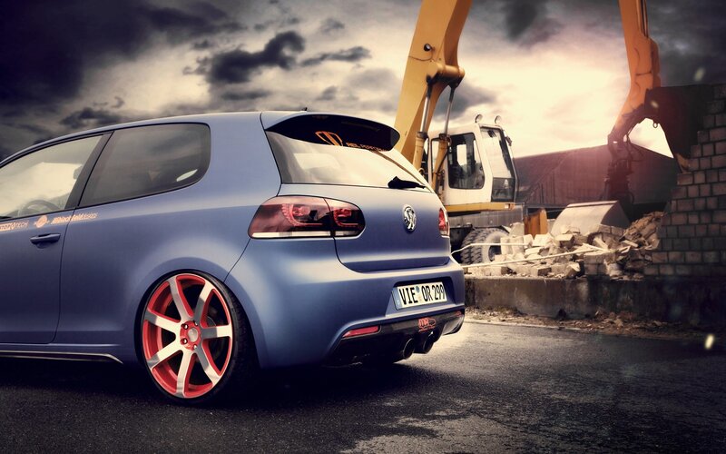 Blue Hatchback Car — Dramatic, Sunset