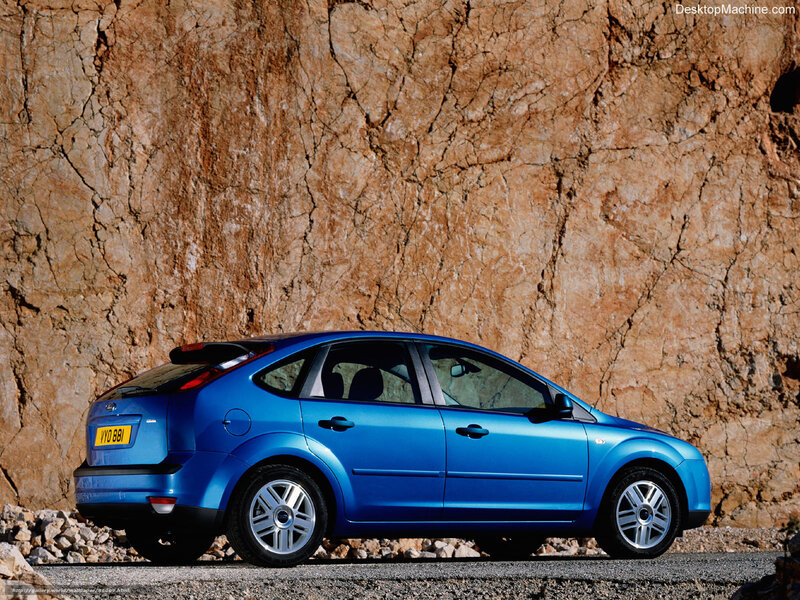 Blue Hatchback Car — Dramatic
