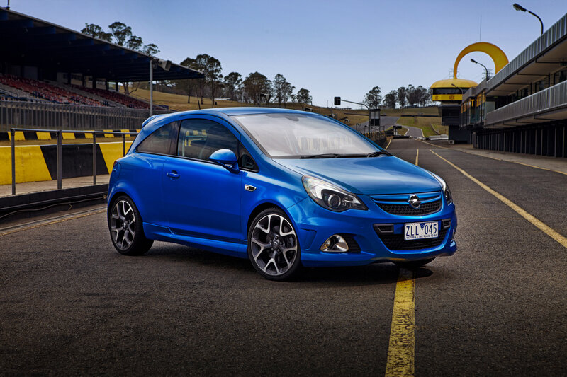 Blue Hatchback Car — Dynamic, Afternoon