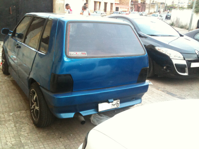 Blue Hatchback Car — Neutral, Afternoon