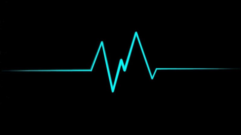 blue heartbeat line on black