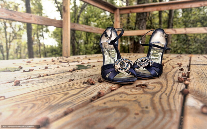 Blue heels on wooden deck