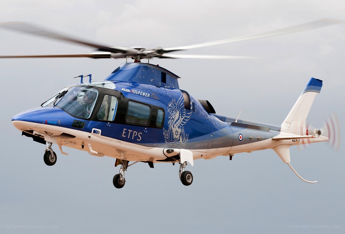blue helicopter in flight