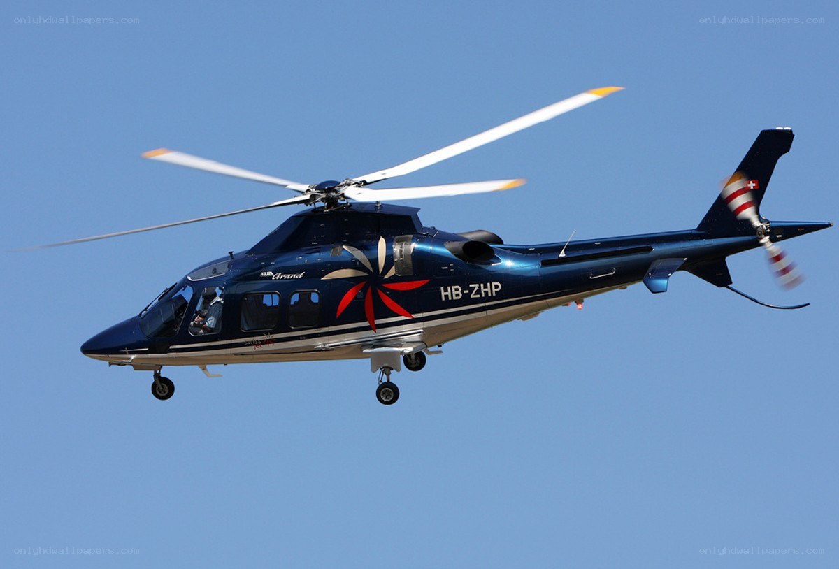 blue helicopter in flight